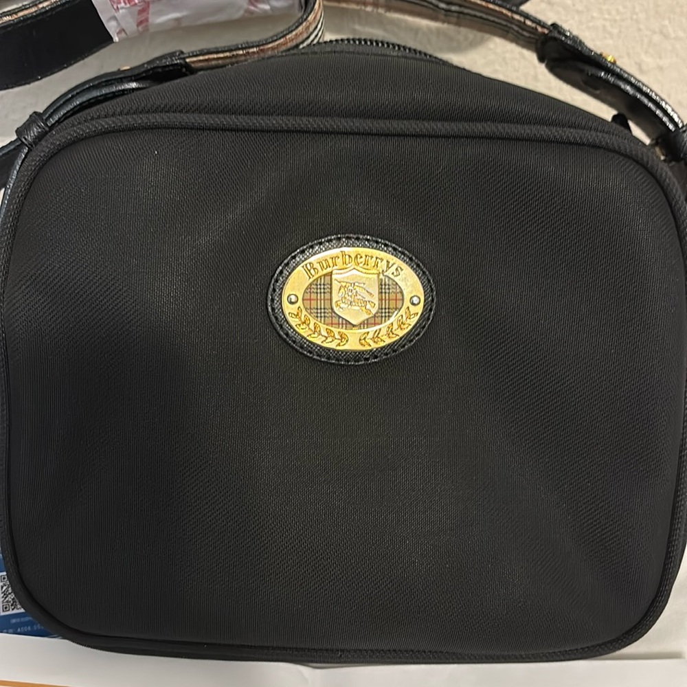 NWT Burberrys Black Crossbody Bag with Gold Emblem